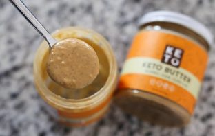 a scoop of the perfect keto nut butter made from macadamia, cashew, coconut butter and mct oil